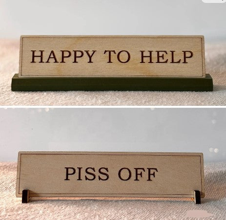 This double-sided personalised wooden desk sign is the perfect funny office gift, featuring “HAPPY TO HELP” on one side and “PISS OFF” on the other. Handcrafted from natural wood, this custom desk sign makes a hilarious desk accessory, ideal as a Secret Santa gift, stocking filler, or unique gift for him or her. Whether you're shopping for a wooden gift, corporate gift, or just a bold desk plate to express your mood, this custom sign is guaranteed to stand out.